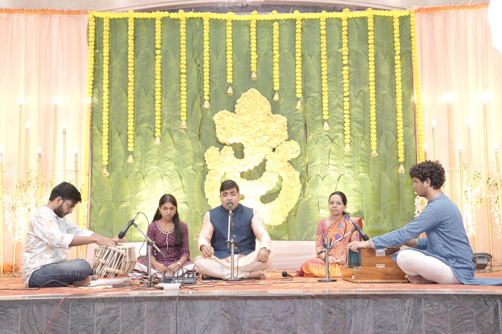 Student practicing Indian classical vocals with an instructor at Swar Brahma Music Academy